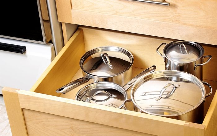 safest way to store heavy pots and pans