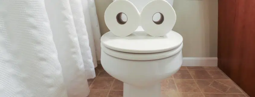 cut tile around a toilet hole?