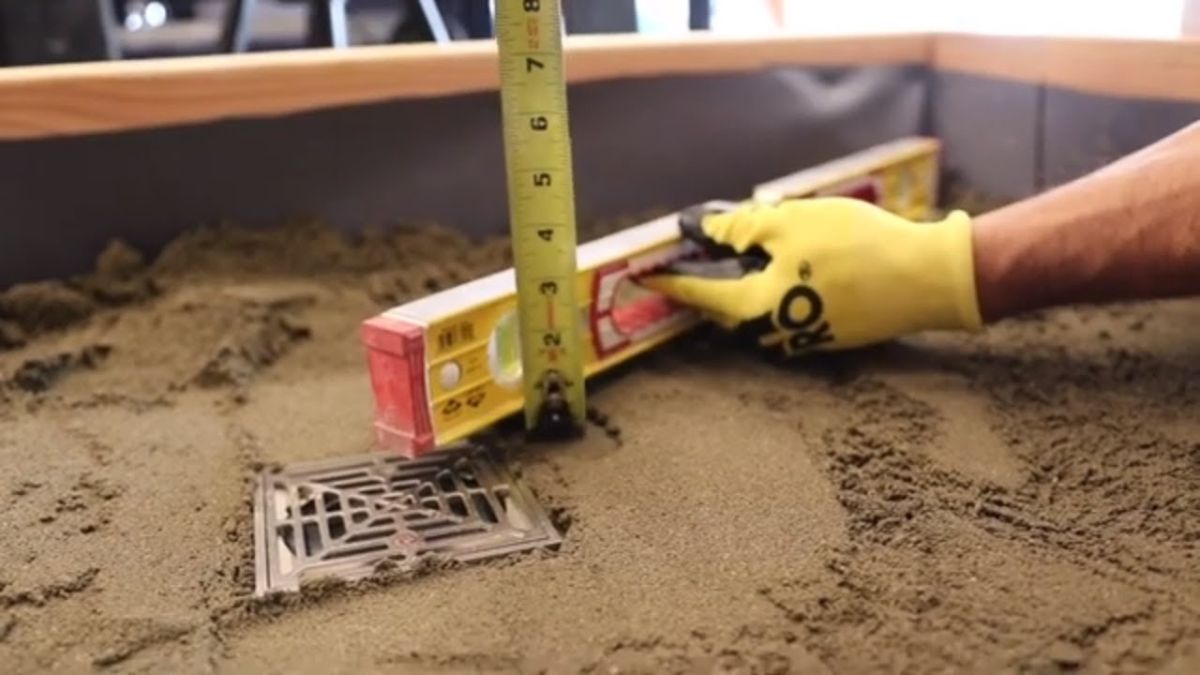 What is the maximum slope for a shower pan?